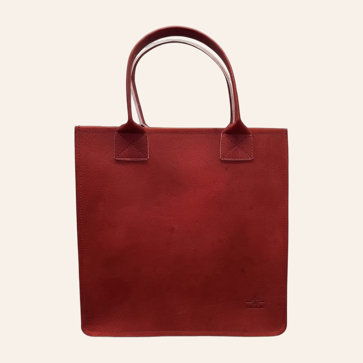 America Handbag (Full Grain Leather) — Structured square tote with X-stitched handles