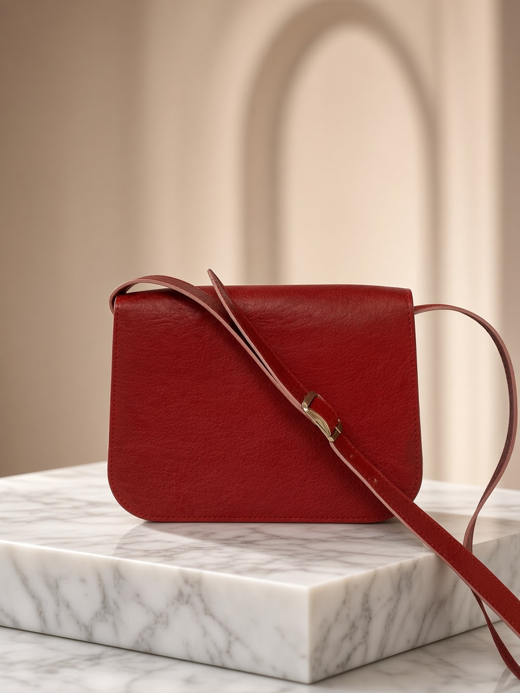 Grace Satchel — Leather satchel with a flap and a slim strap